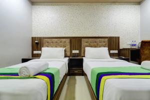 Foto Mumbais asuva majutusasutuse Hotel New Blue Sapphire Residency galeriist