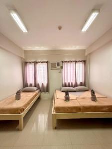 Postel nebo postele na pokoji v ubytování LOC Residence Inn