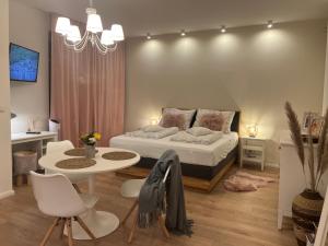 Voodi või voodid majutusasutuse Die "Boho Suite" im Herzen von Hartberg I Parking toas