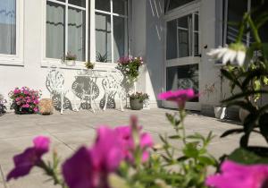 Aed väljaspool majutusasutust Die "Boho Suite" im Herzen von Hartberg I Parking