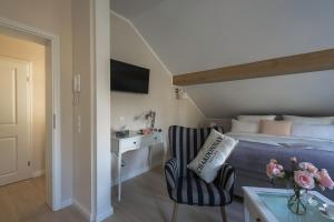 Postel nebo postele na pokoji v ubytování Nostalgie-Nest mit Boxspringbett