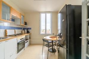 Η κουζίνα ή μικρή κουζίνα στο Azurine - Appt pour 4 proche de Paris