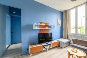 Μια τηλεόραση ή/και κέντρο ψυχαγωγίας στο Azurine - Appt pour 4 proche de Paris