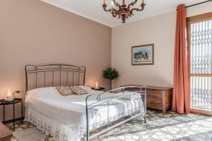 Postel nebo postele na pokoji v ubytování Casa Olimpia