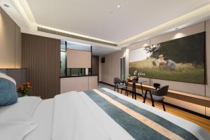 Foto sihtkohas Hanqiyu asuva majutusasutuse 张家界十八涧智能轻奢影音民宿 galeriist
