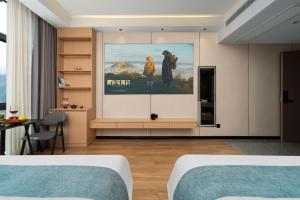 Foto sihtkohas Hanqiyu asuva majutusasutuse 张家界十八涧智能轻奢影音民宿 galeriist