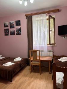 Postel nebo postele na pokoji v ubytování Nectar hotel