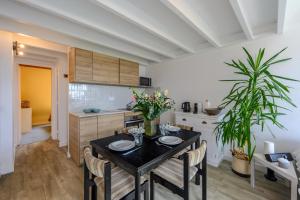 Kuchyň nebo kuchyňský kout v ubytování L'Appel du Large - Duplex vue mer Penvins Sarzeau