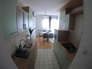 A cozinha ou cozinha compacta de Apartment Ena