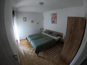 Cama ou camas em um quarto em Apartment Ena