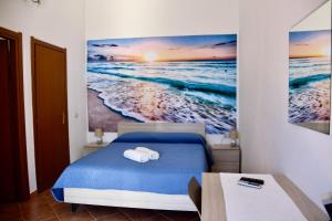 Кровать или кровати в номере Agriturismo Ezzi Mannu