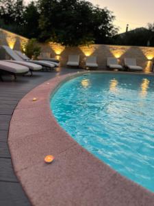 Bazén v ubytovaní Luxury Apartments VilaMaloca alebo v jeho blízkosti