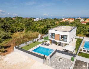 Πισίνα στο ή κοντά στο Villa Menalo