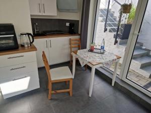 Kuchyň nebo kuchyňský kout v ubytování Apartment am Rathaus + 7 fotografií