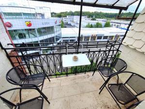 Balkón nebo terasa v ubytování Modern & Chic Apartment with Balcony in Offenbach