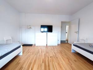 Postel nebo postele na pokoji v ubytování Modern & Chic Apartment with Balcony in Offenbach