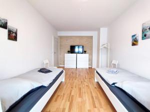 Postel nebo postele na pokoji v ubytování Modern & Chic Apartment with Balcony in Offenbach
