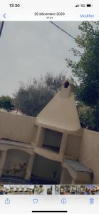 Angoville-au-PlainにあるVilla Saïdiaの屋根の建物の写真