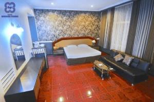 Bandung Permai Hotel Jember客房内的一张或多张床位
