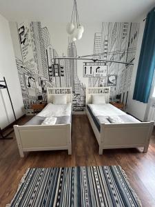 Posteľ alebo postele v izbe v ubytovaní Atelier Hostel