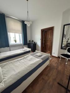 Posteľ alebo postele v izbe v ubytovaní Atelier Hostel