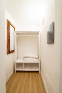 A bed or beds in a room at Residenza d'Epoca Galleria dell'Accademia