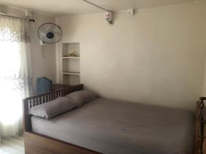 Postel nebo postele na pokoji v ubytování Samriddhi HomeStay