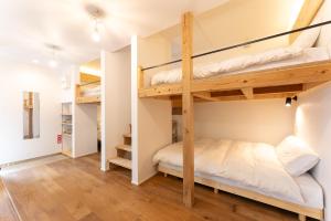 Uma cama ou camas num quarto em 強羅base B棟 - GORA base B