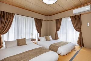 Katil atau katil-katil dalam bilik di Azami Ann Maisonette