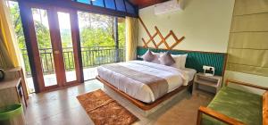 Postel nebo postele na pokoji v ubytování Vythiri Holiday Resort, Wayanad + 37 fotografií