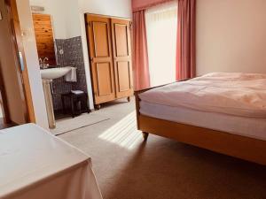 Postel nebo postele na pokoji v ubytování Haus Wilhelm