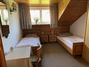 Postel nebo postele na pokoji v ubytování Haus Wilhelm