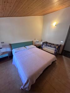 Posteľ alebo postele v izbe v ubytovaní Residence L'Oliveto Garden and Swimming pool
