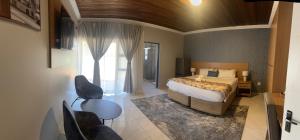 Katil atau katil-katil dalam bilik di Vilanculos Guesthouse