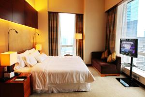 Postel nebo postele na pokoji v ubytování The Westin Guangzhou