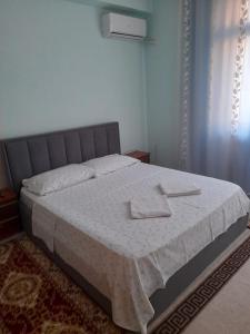 Postel nebo postele na pokoji v ubytování Hotel Luli City Center