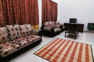 Χώρος καθιστικού στο Amin Homestay Jln Langgar HSB
