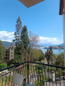 a balcony with a view of a body of water at Del Rampolino Arancio in Stresa