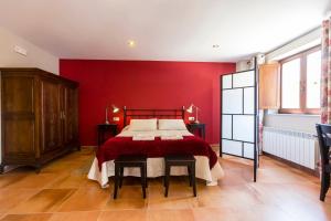 Postel nebo postele na pokoji v ubytování Hotel Rural Somiedo