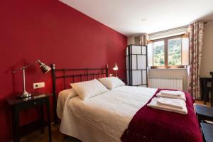 Postel nebo postele na pokoji v ubytování Hotel Rural Somiedo