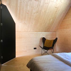 Ένα ή περισσότερα κρεβάτια σε δωμάτιο στο Burgstrasse Apartment Ost mit Garten und Sauna