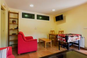 Posezení v ubytování Hotel Rural Somiedo