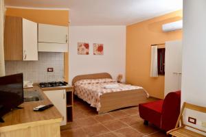 Кровать или кровати в номере Agriturismo Ezzi Mannu