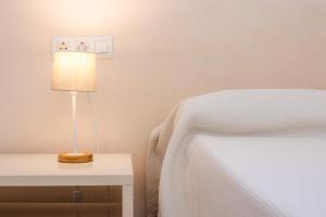 A bed or beds in a room at Can Claret