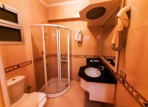 Koupelna v ubytování Beau Site Hotel + 37 fotografií
