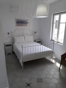 Postel nebo postele na pokoji v ubytování Filenia