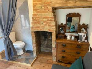 Příslušenství pro přípravu čaje a kávy v ubytování The old wash house