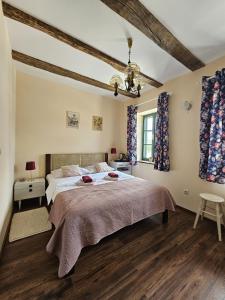 Posteľ alebo postele v izbe v ubytovaní Taverna 1860 Rooms & Apartments
