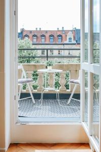 Un balcon sau o terasă la namastay! Stilvoll Wohnen in Bestlage Mannheims - 3BR +28 fotografii