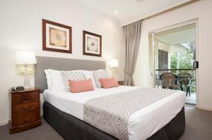 Letto o letti in una camera di Paradise Links Resort Port Douglas